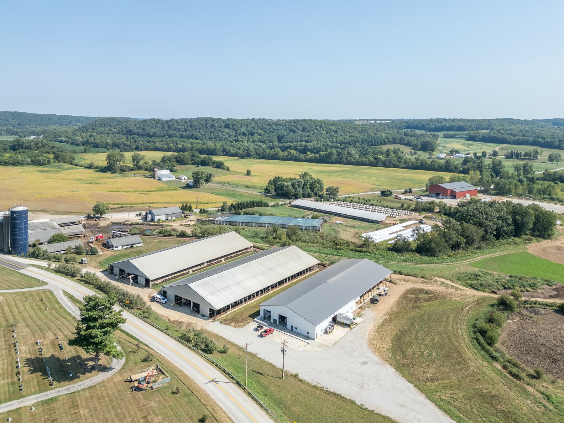Aerial view of agricultural livestock buildings and farmland