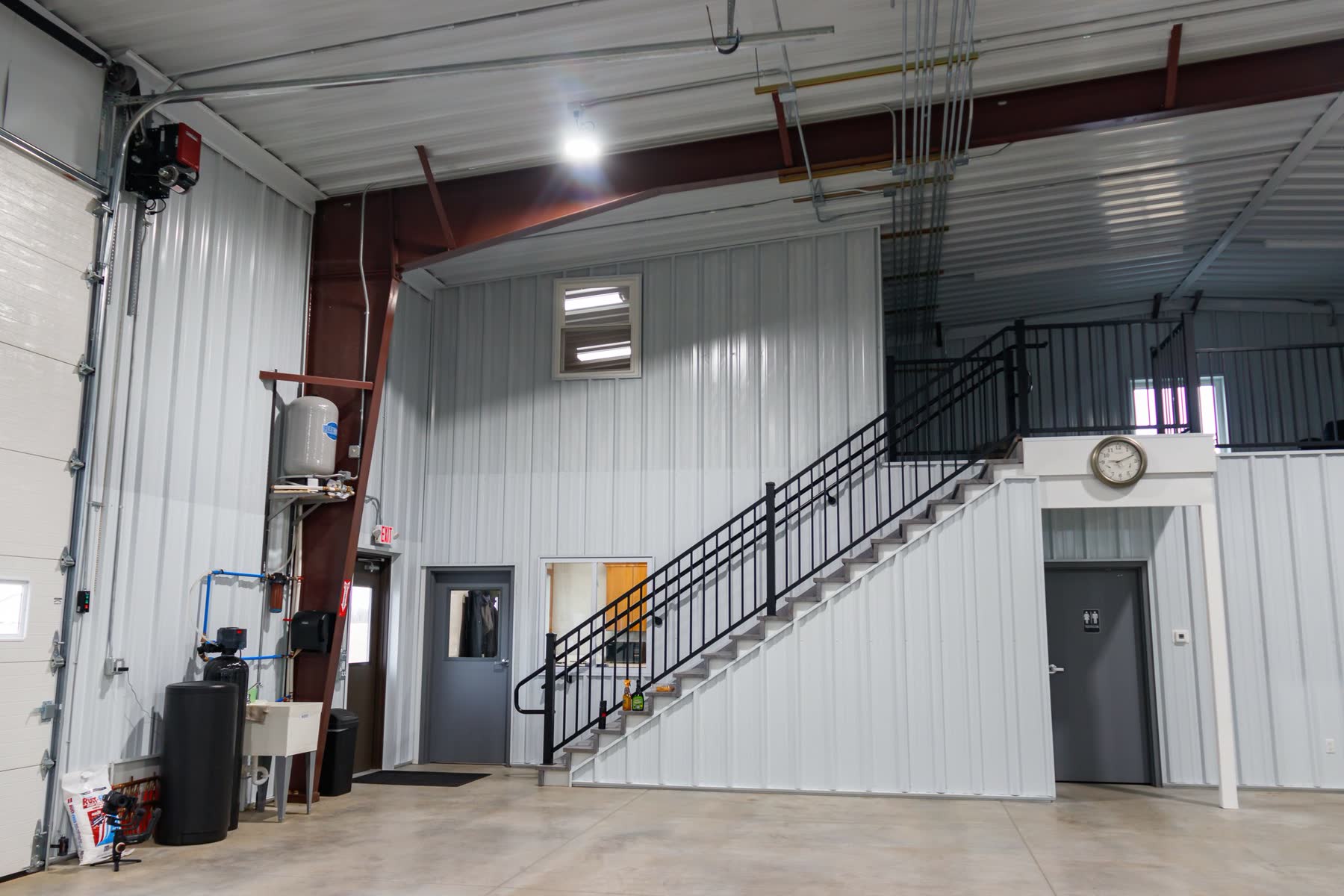 Manufacturing facility interior with high clearance