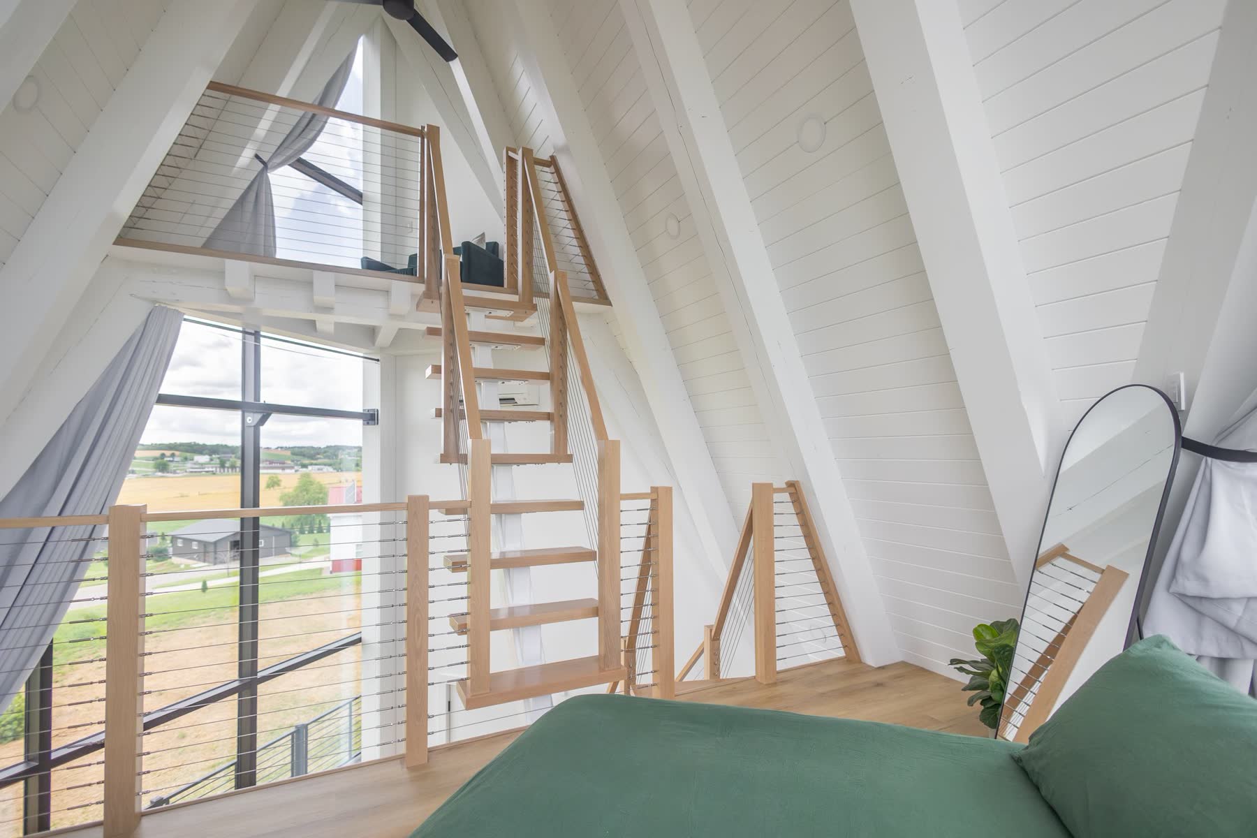 A-frame loft stairway with cable railing